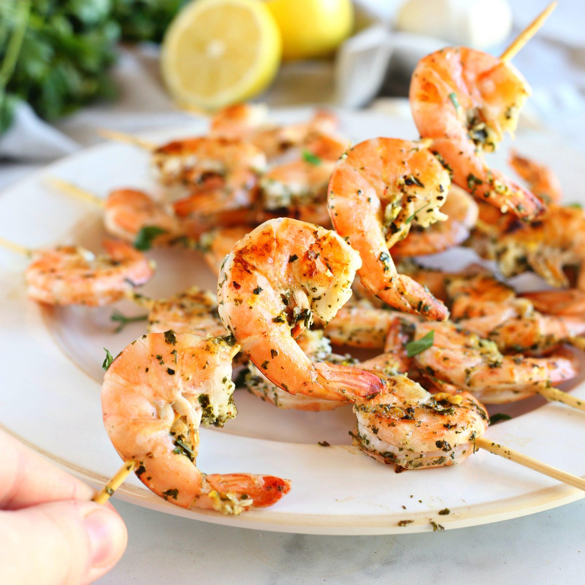 lemon-garlic shrimp skewers on a grill