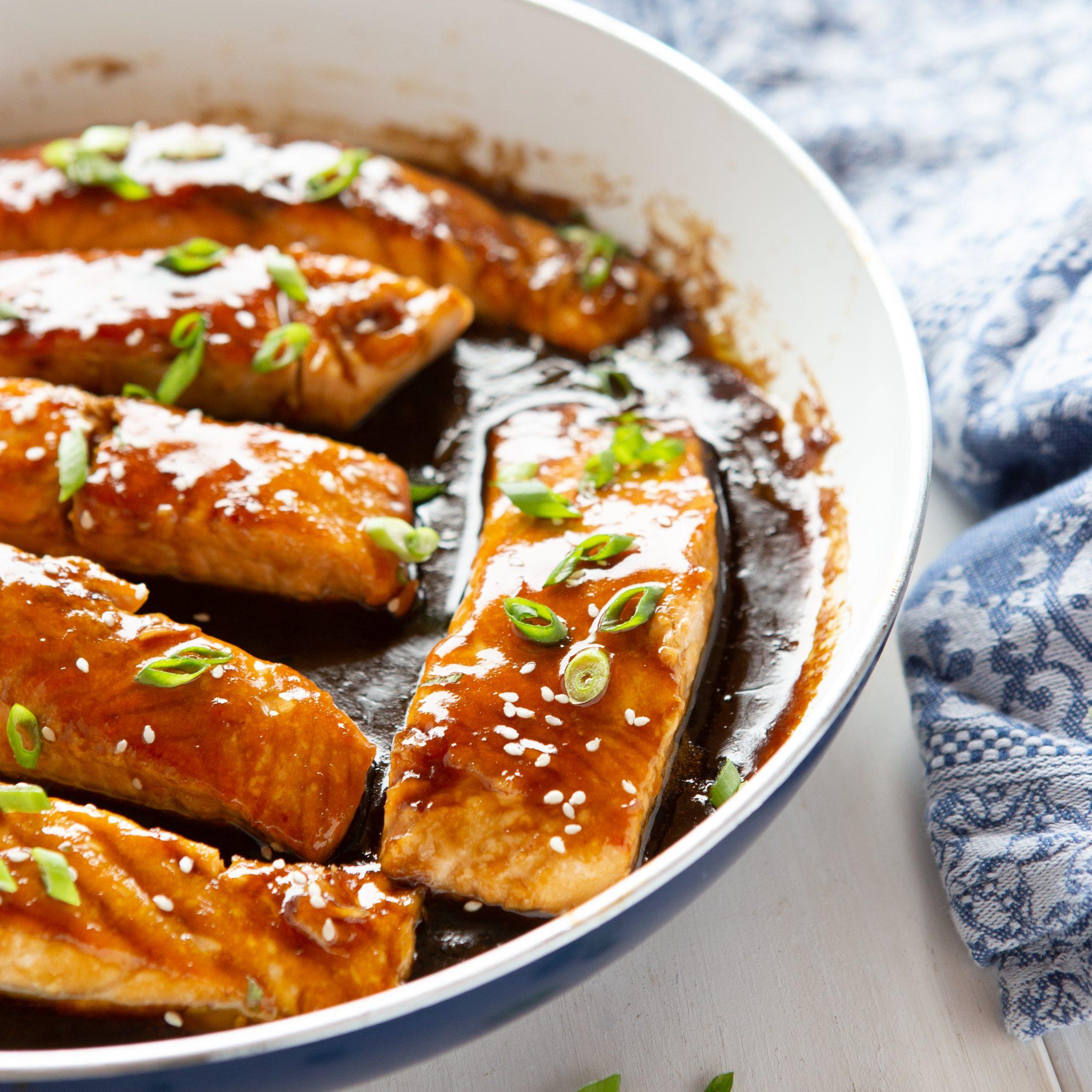 Close up of the Simple One-Pot Teriyaki Salmon, showcasing the glossy teriyaki glaze