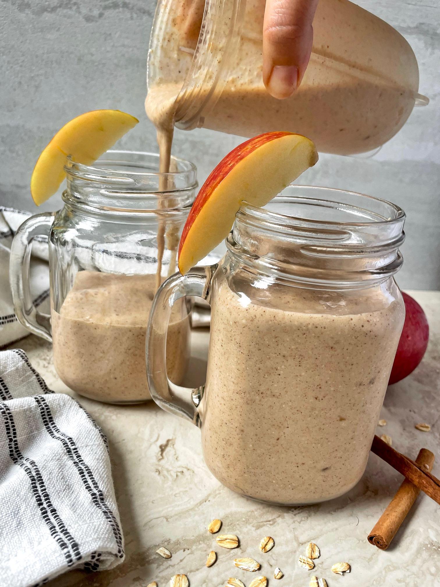apple pie spiced smoothie being poured into a glass