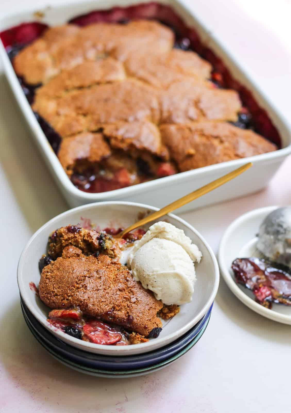 A whole Paleo Fruit Cobbler in a baking dish