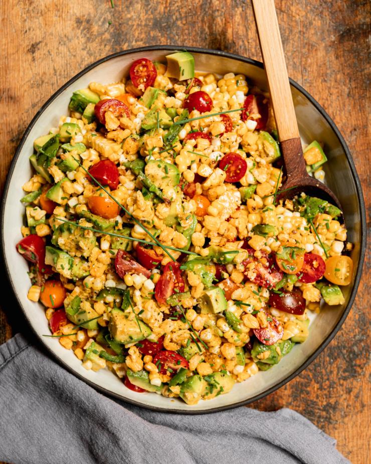 overhead shot of a colorful corn and avocado salad
