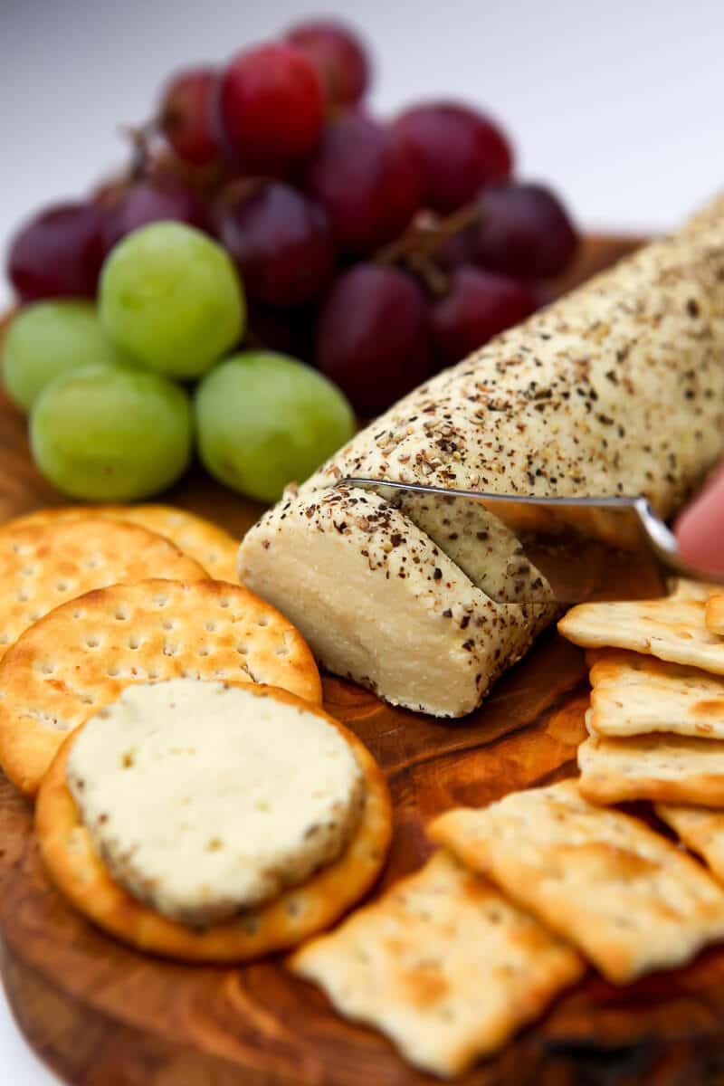 vegan goat cheese on crackers and vegetables
