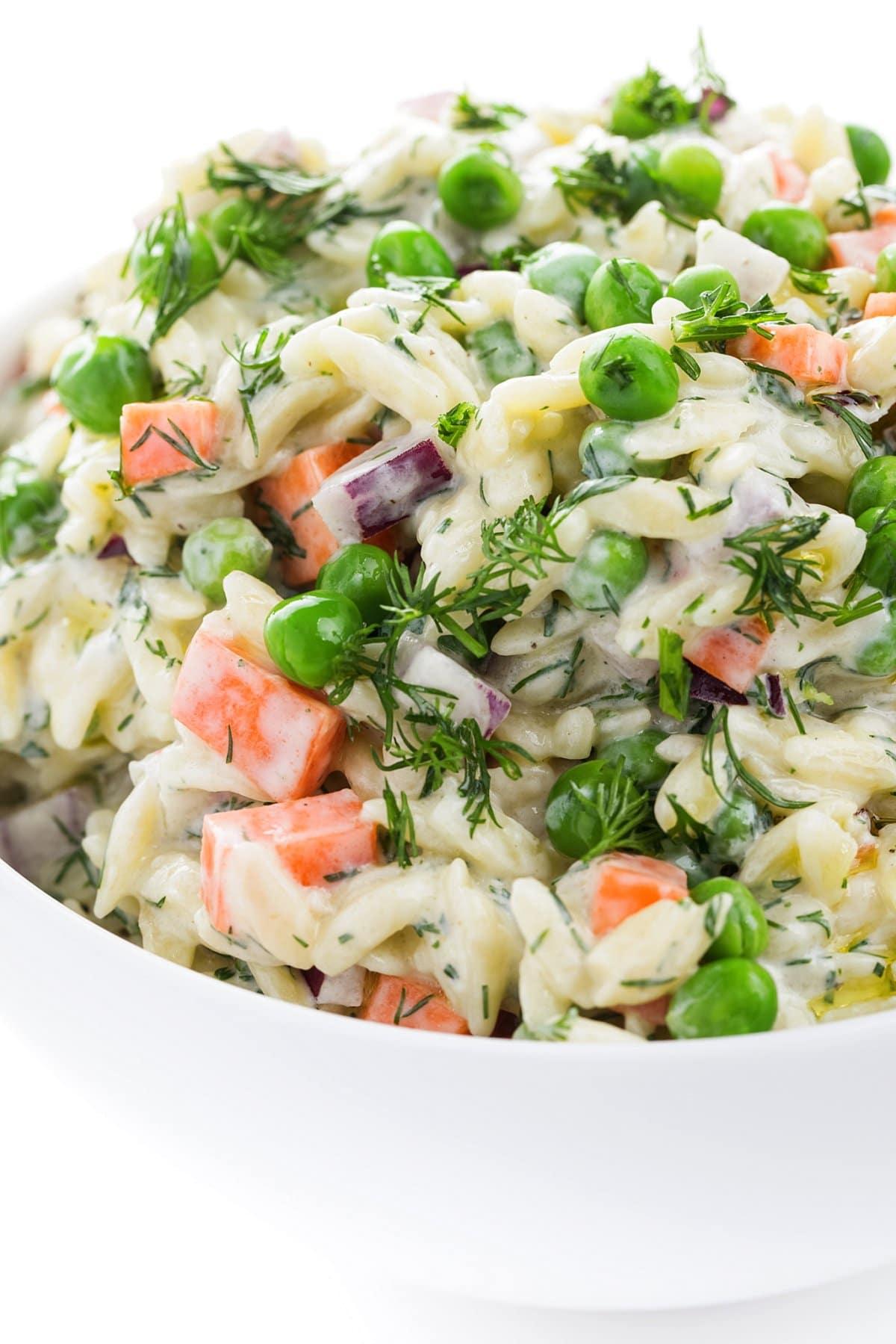 Close up of a bowl of gravlax and orzo salad