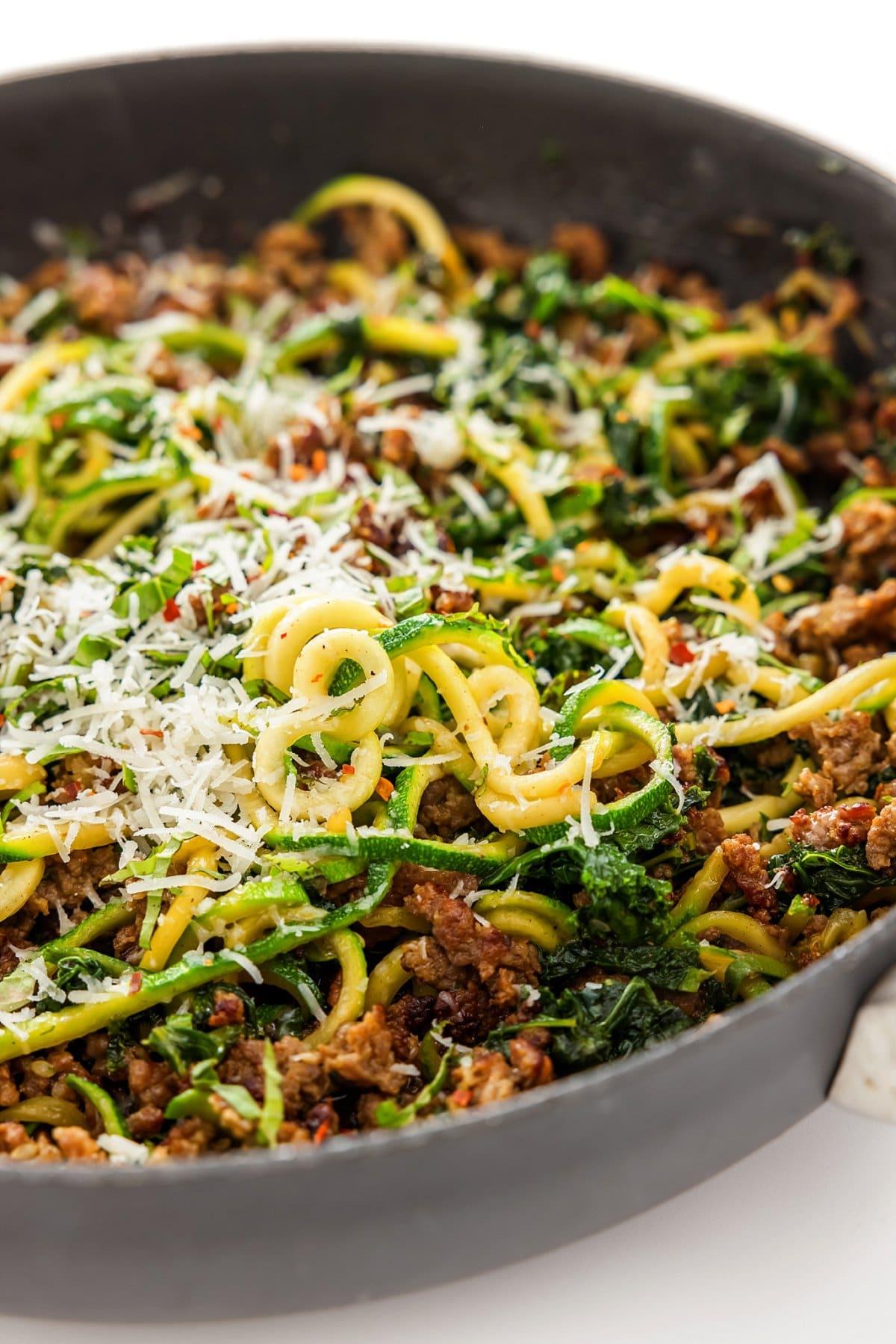 Close-up shot of One-Pan Lemon Parmesan Zoodles and Sausage
