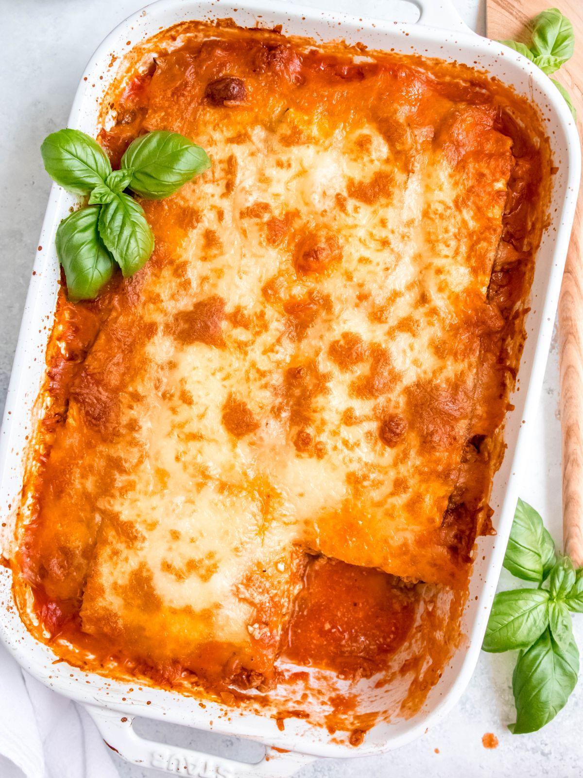 A wider shot of the entire zucchini lasagna dish, beautifully presented in the baking dish.