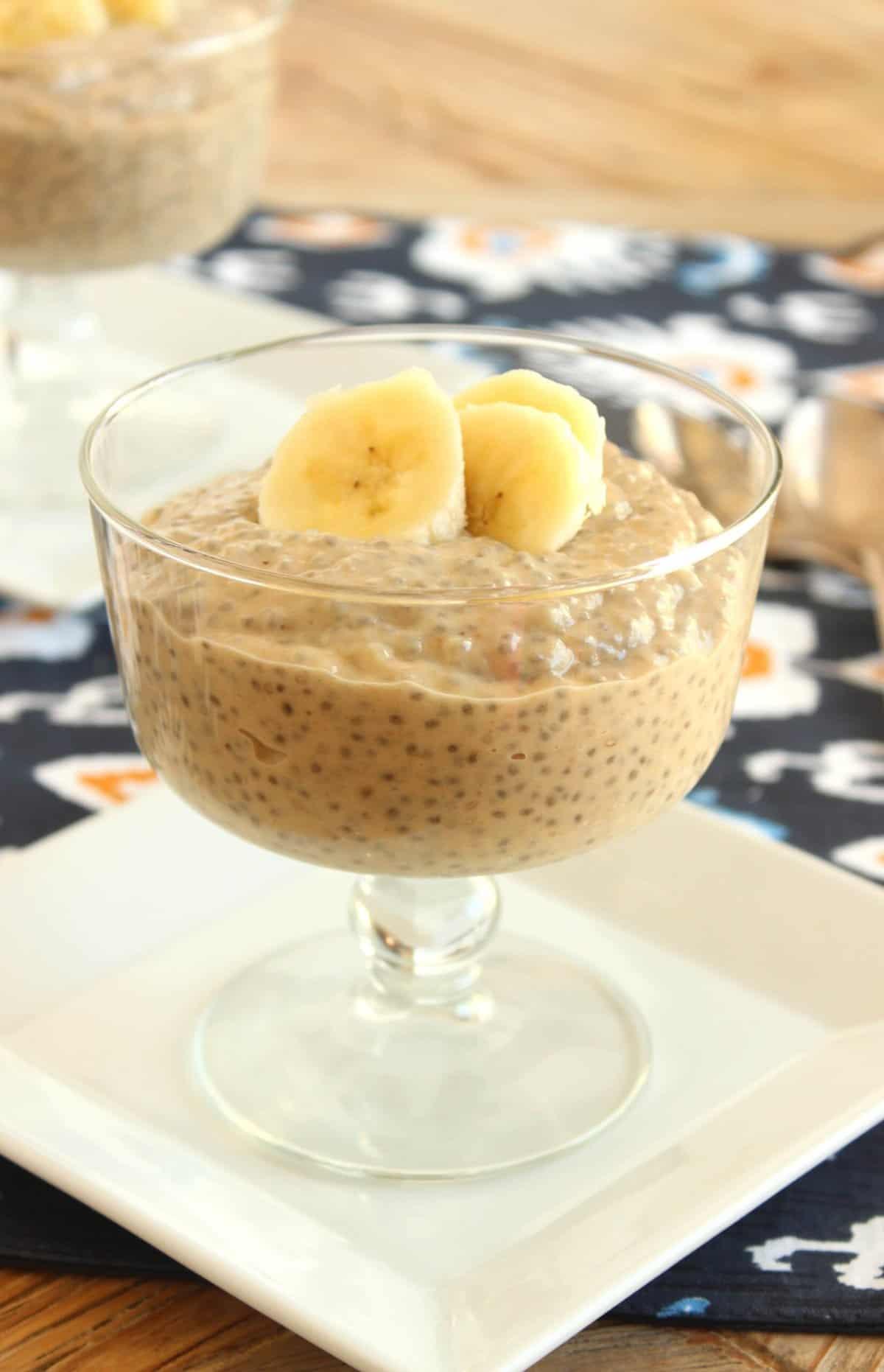 A person enjoying a bowl of peanut butter banana chia pudding
