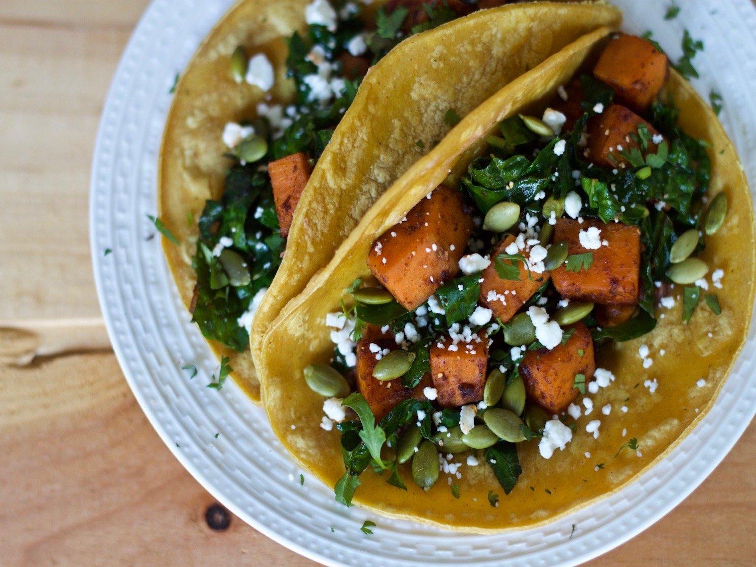 sweet potato and kale tacos with various toppings