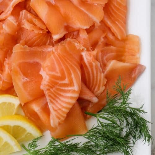 close-up shot of sliced saffron and lemon gravlax on a plate