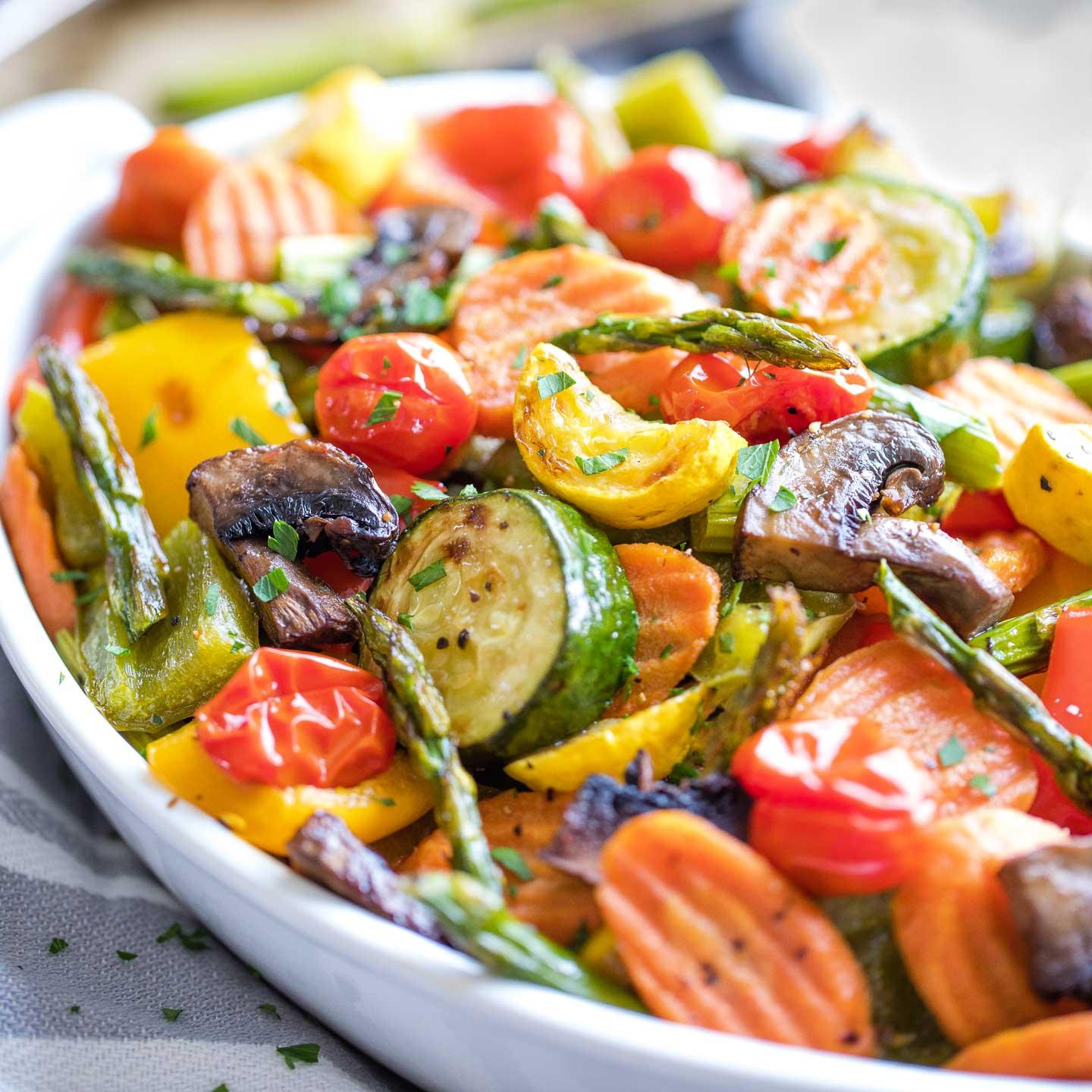 Close-up shot of the vibrant colors and textures of the sautéed vegetables, showcasing the spices and herbs