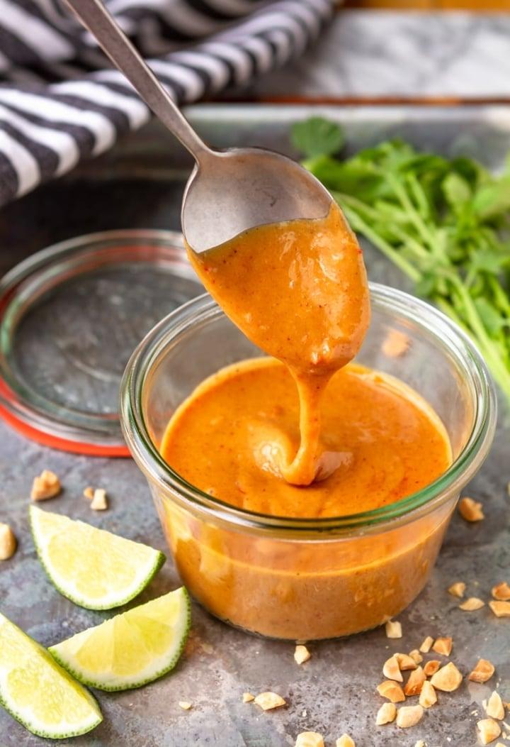 A close-up shot of the creamy peanut sauce, showing its texture and rich color.