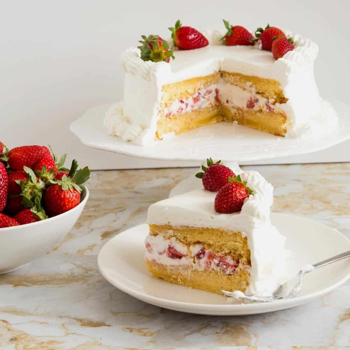 A light and airy genoise cake, sliced to show its delicate texture.