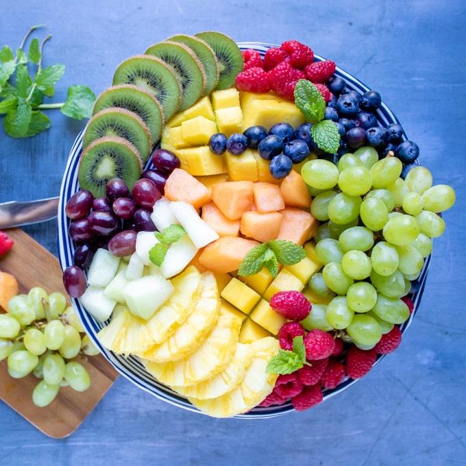 A fruit platter with various fruits arranged attractively