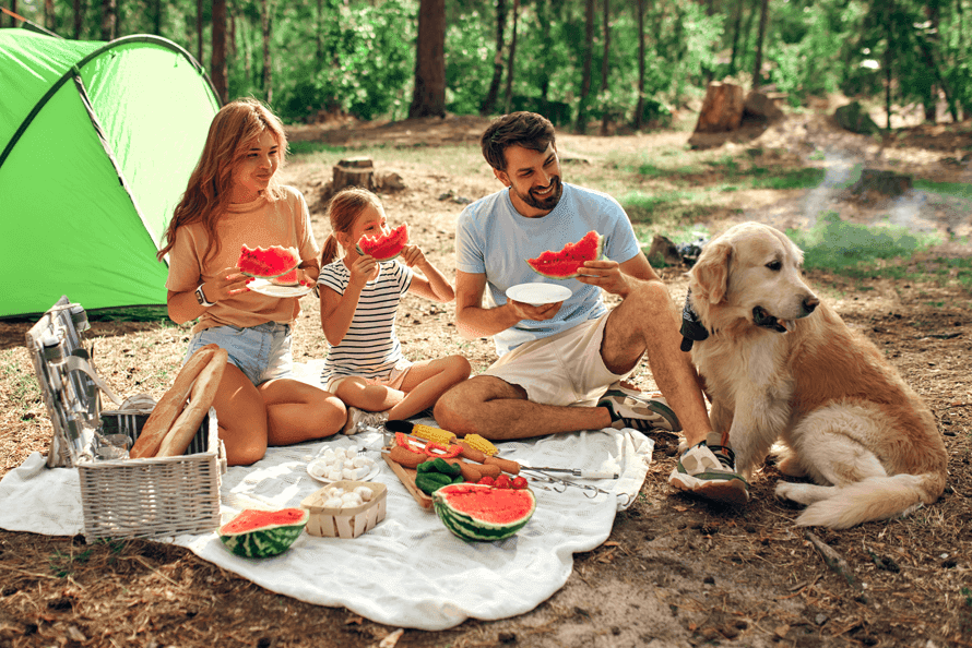A family enjoying fruity cherry kabobs outdoors
