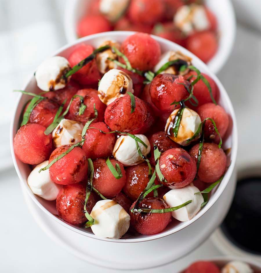 vibrant watermelon and mozzarella salad with a balsamic glaze drizzle