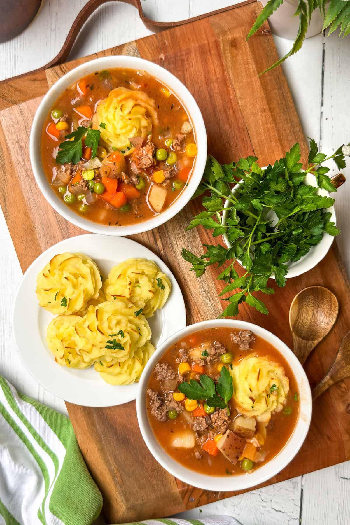 family gathered around a table, enjoying bowls of shepherd's pie soup
