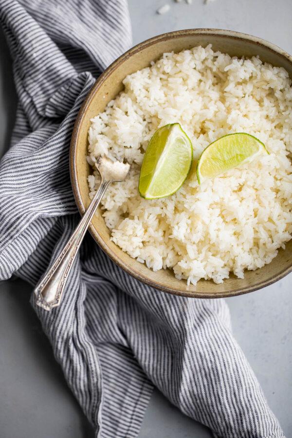 close-up of perfectly steamed rice glistening with coconut oil