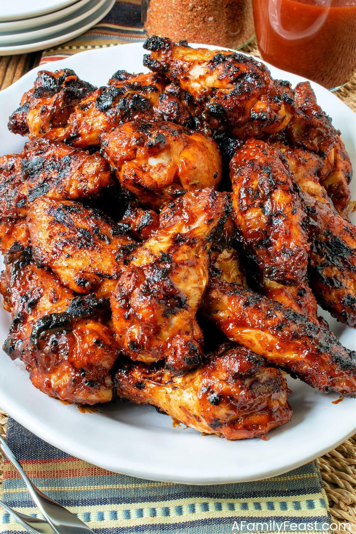 grilled bourbon bbq chicken wings with char marks