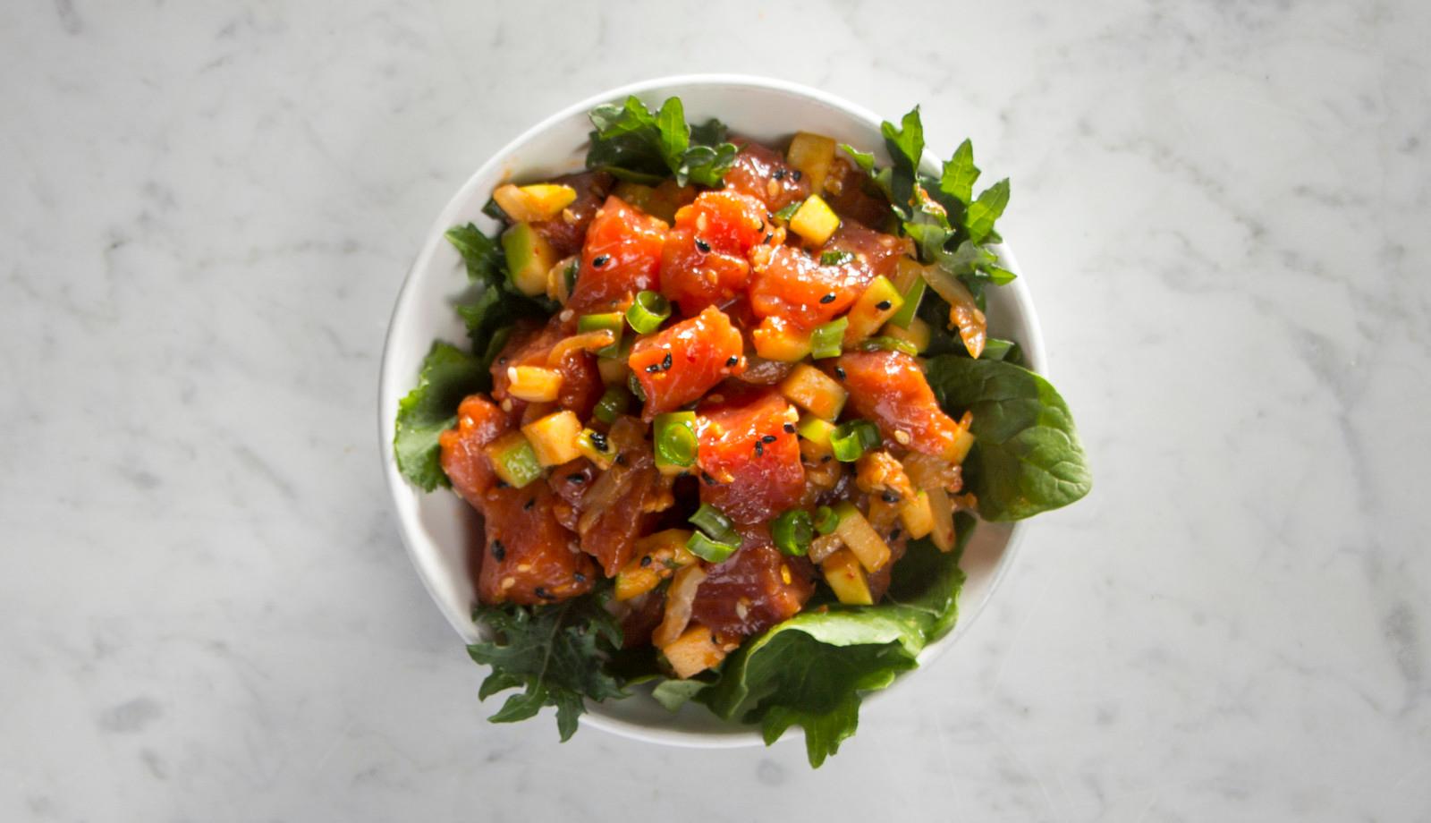 Close up of a Korean BBQ poke bowl with all ingredients visible