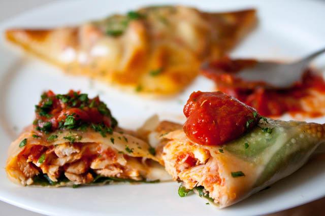 Close-up shot of Chicken Parm Lettuce Wraps with marinara and mozzarella