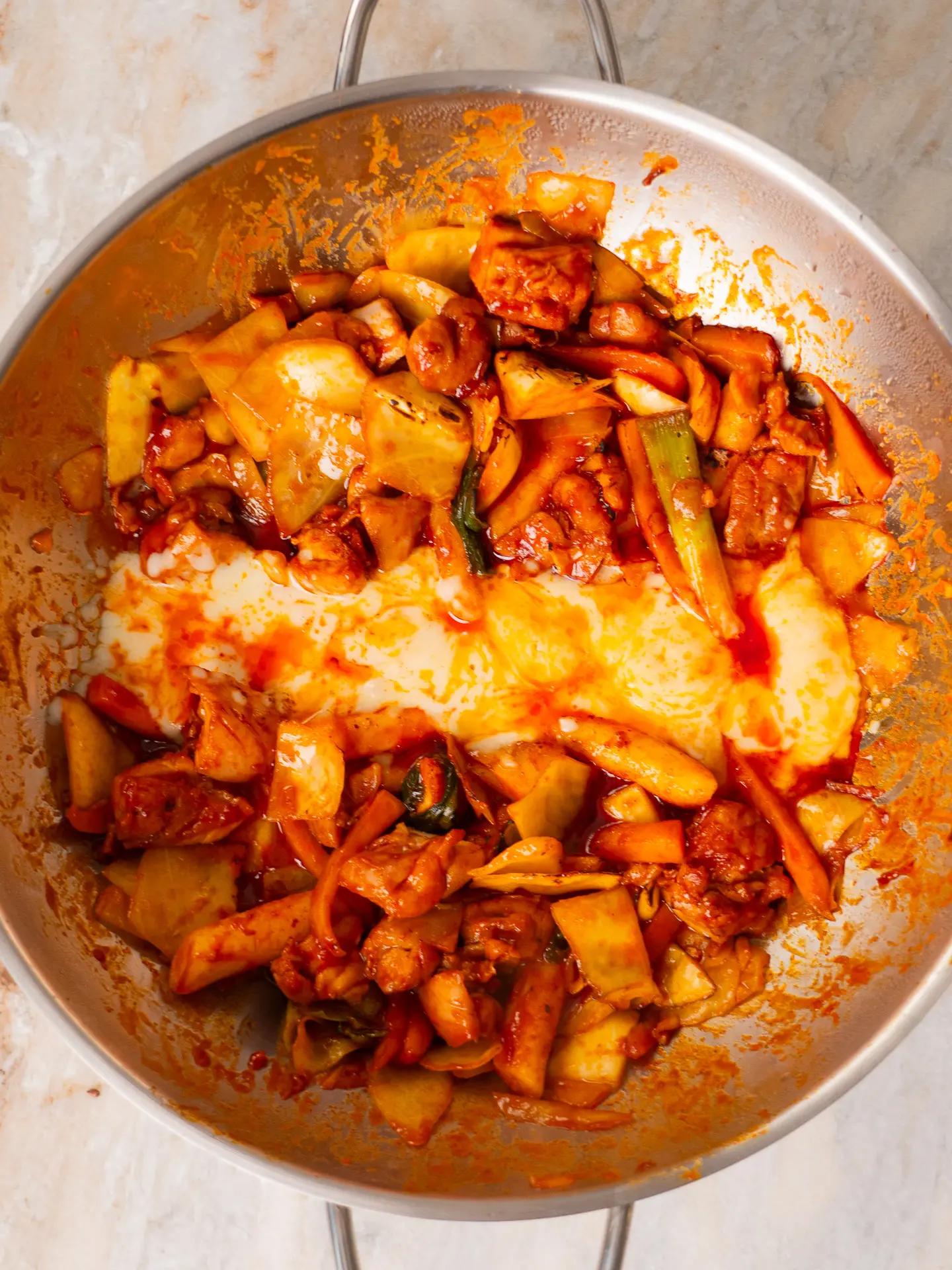 close up of korean chicken and radish stir fry showing texture