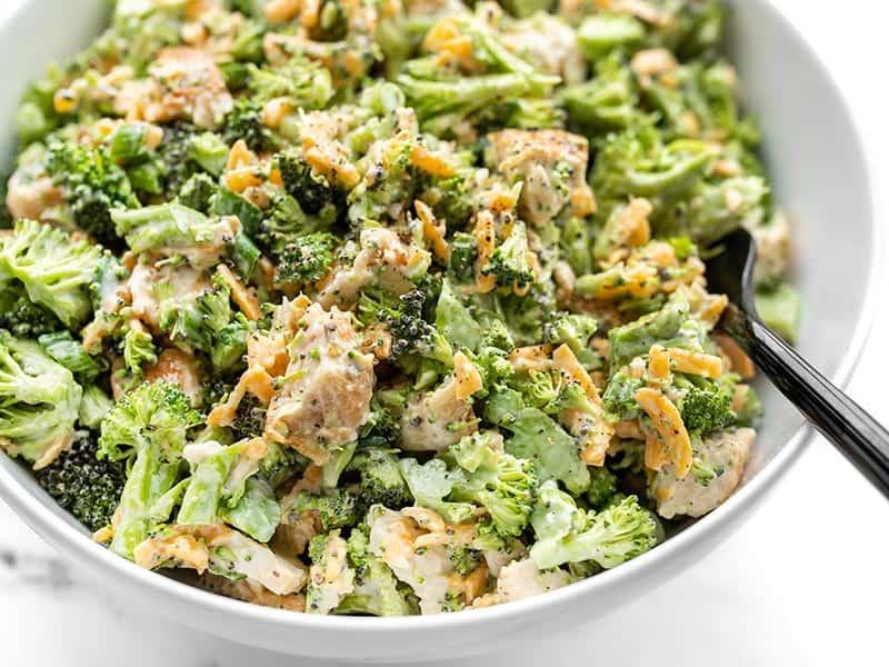 Close-up shot of a portion of broccoli cheddar salad