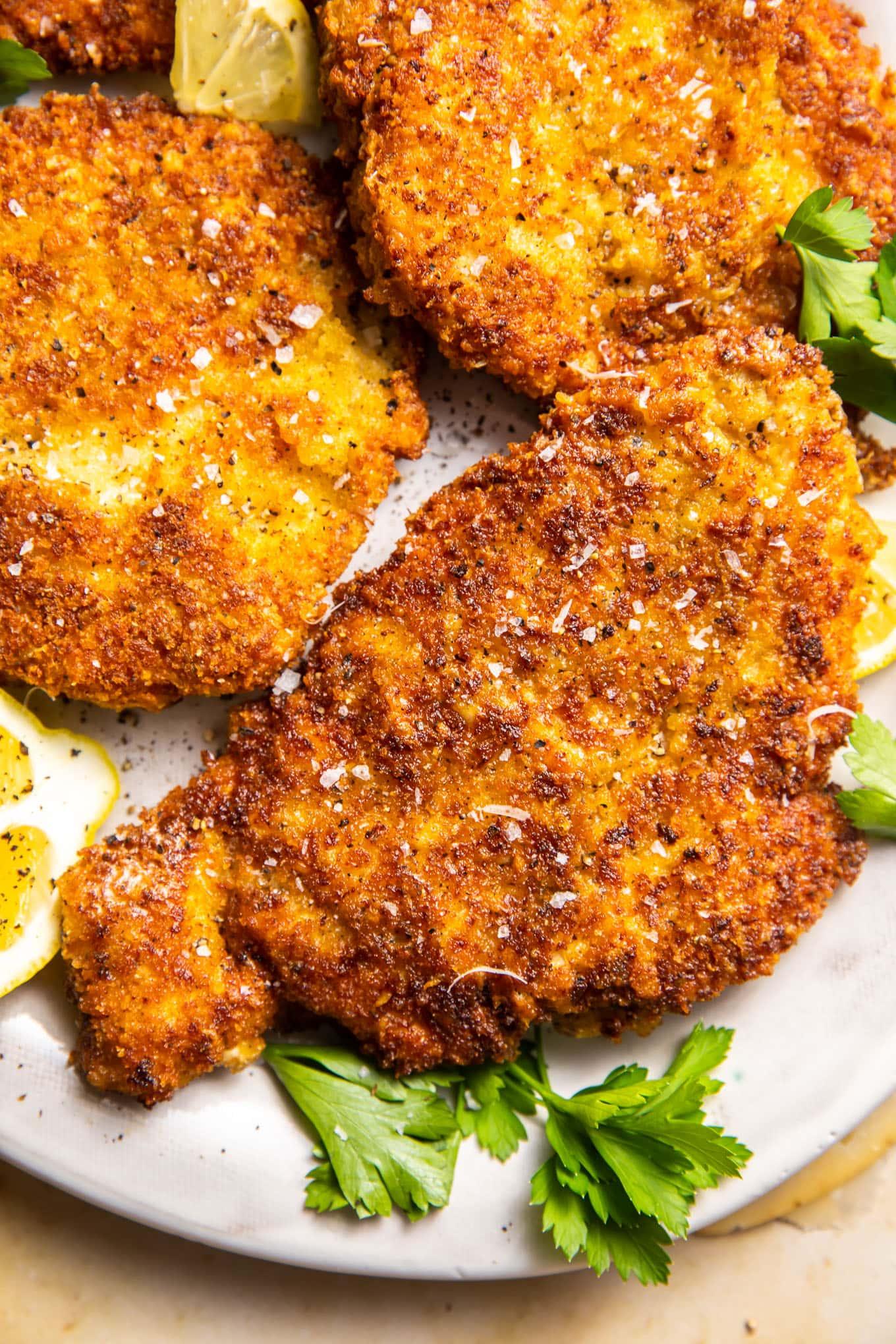 Close up shot of crispy parmesan-crusted fried chicken