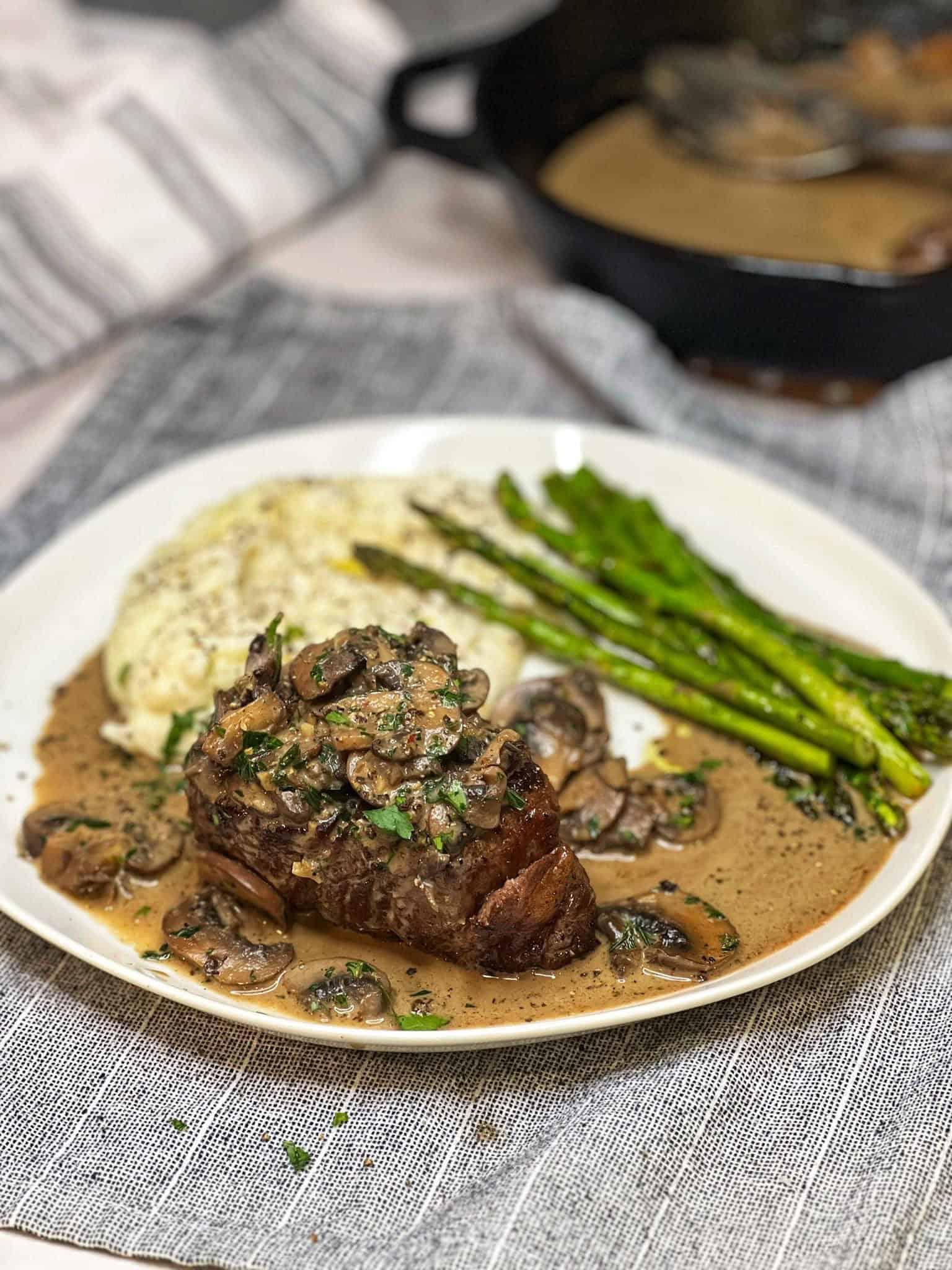 A beautifully roasted beef with a rich mushroom sauce, garnished with fresh parsley