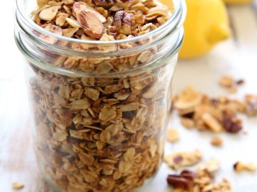close-up shot of lemon zest being added to granola