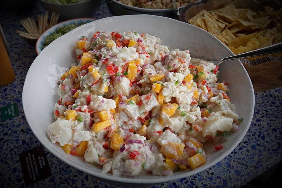 fresh tropical mango ceviche with coconut milk served in a bowl