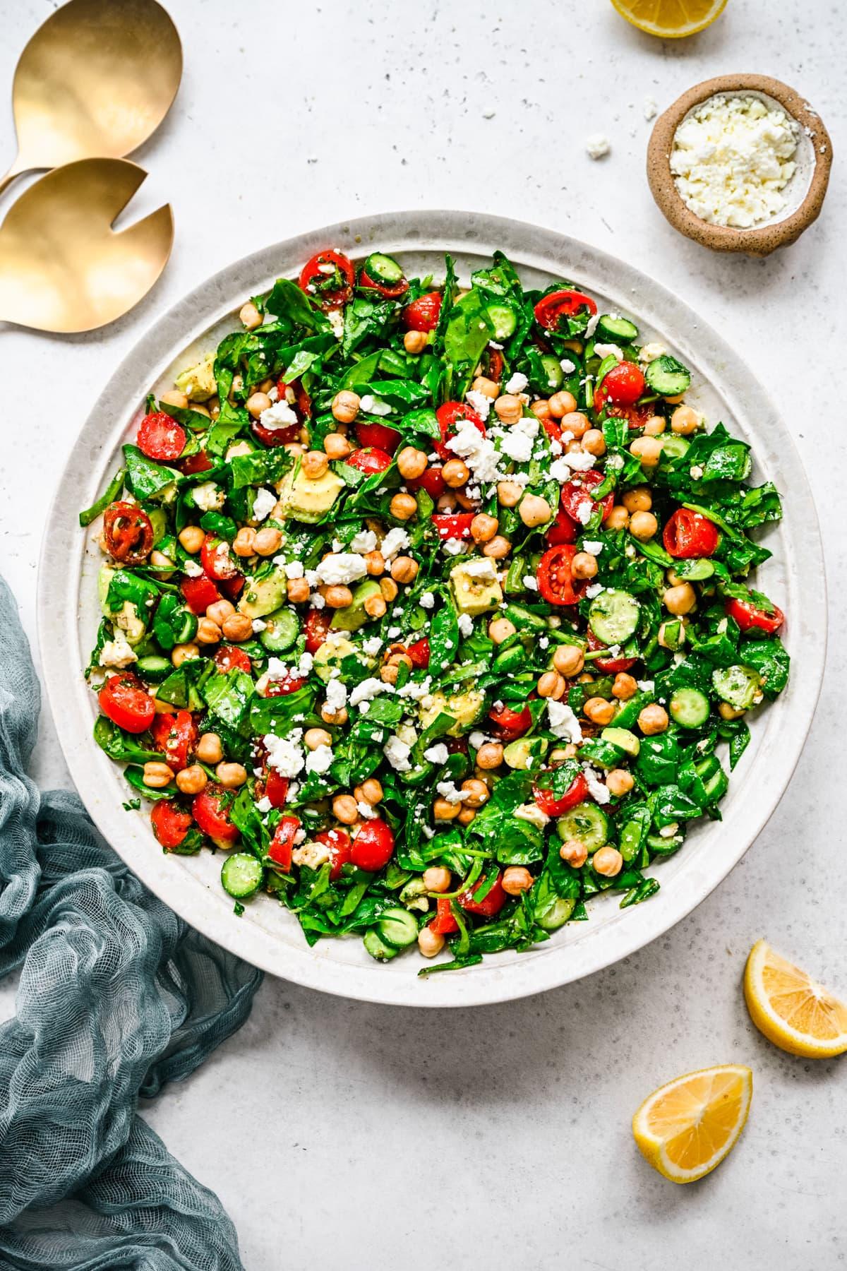 Chickpea and spinach salad served in individual bowls