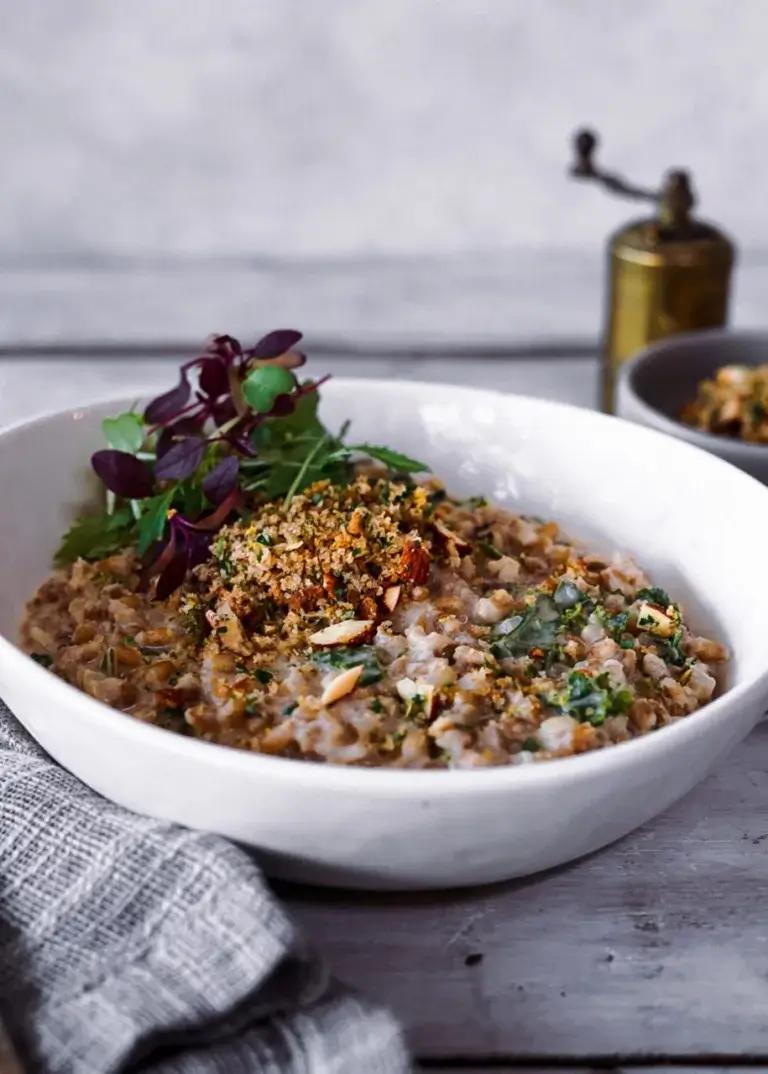Close-up of creamy barley risotto with lamb and Parmesan