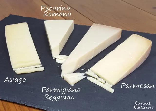 A close-up shot of the different cheeses used in the risotto: Parmesan, Pecorino Romano, Asiago, provolone, and mozzarella