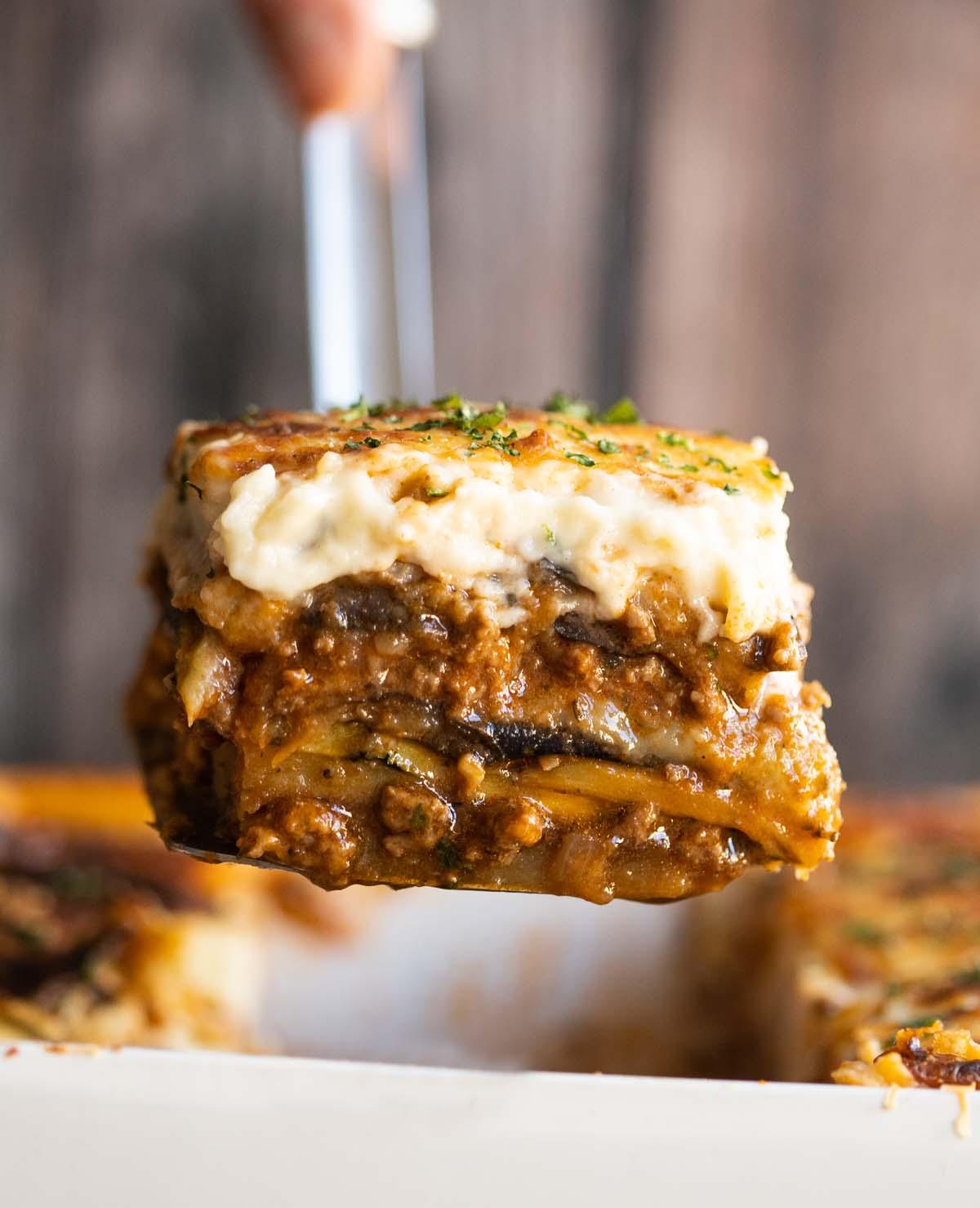 close up shot of a slice of moussaka inspired pasta bake