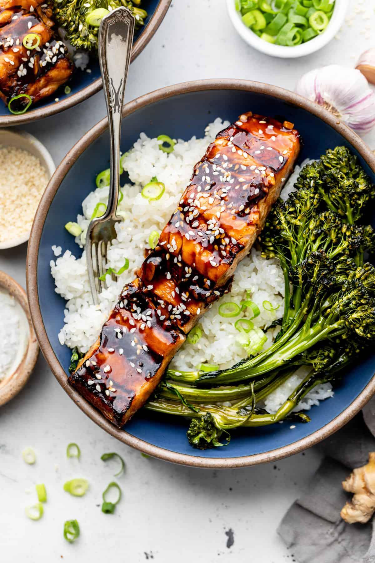 Close-up of perfectly grilled salmon fillet with teriyaki glaze, glistening