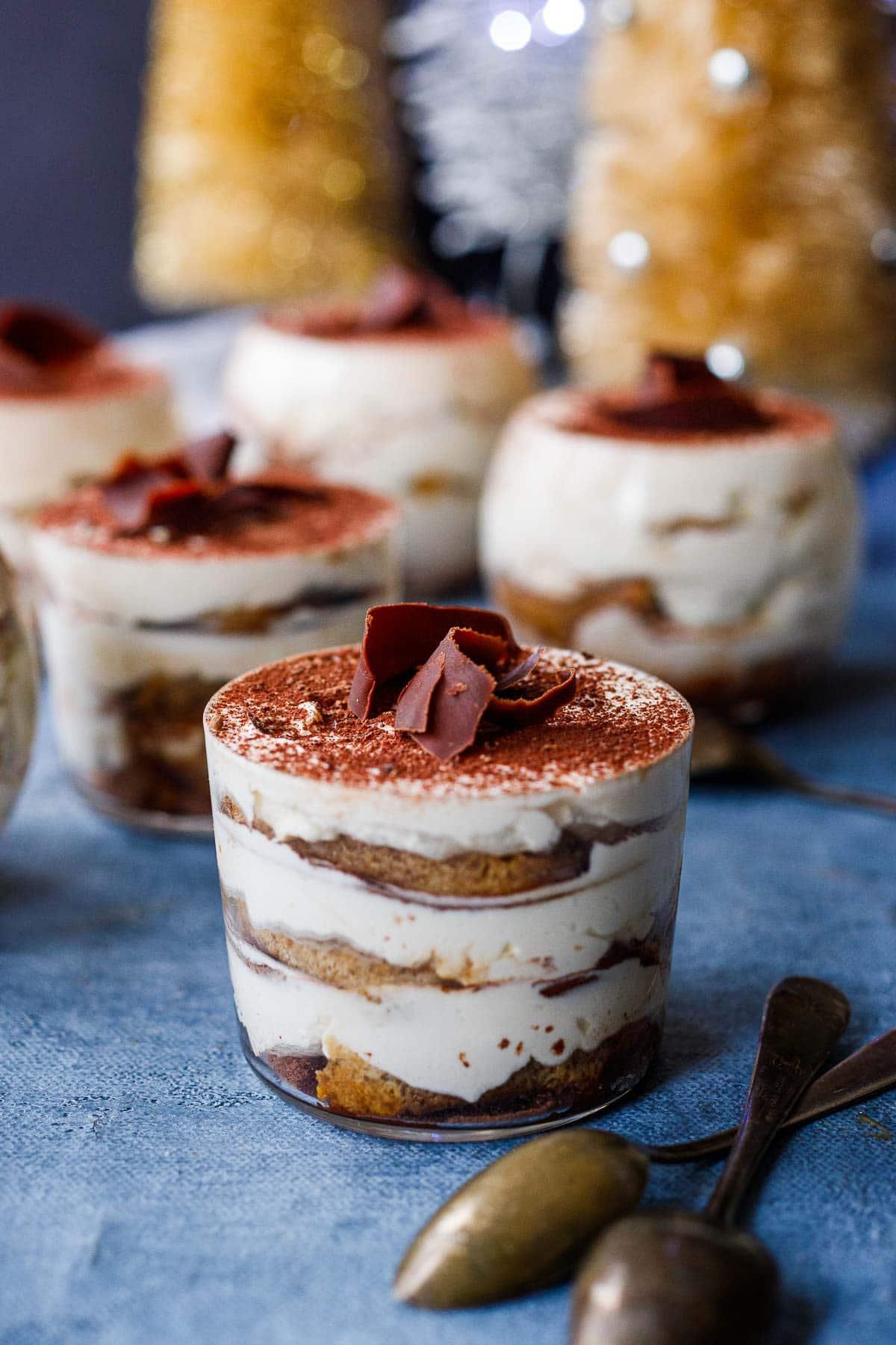 Close-up shot of deviled eggs with a tiramisu twist, showing layers of coffee-flavored filling and cocoa powder dusting.