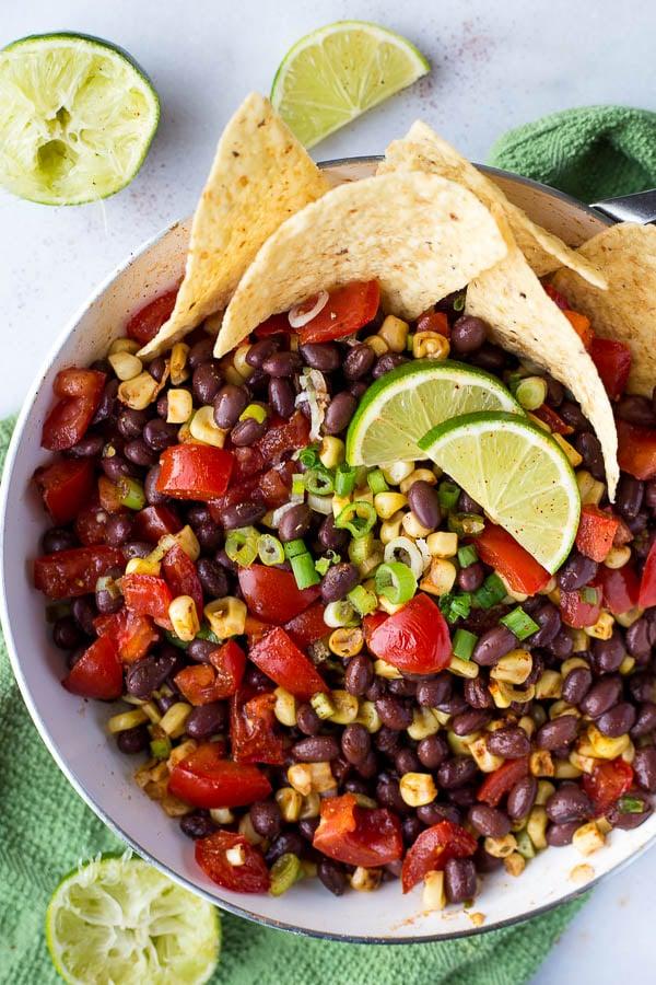Close up shot of ceviche with quinoa and black beans