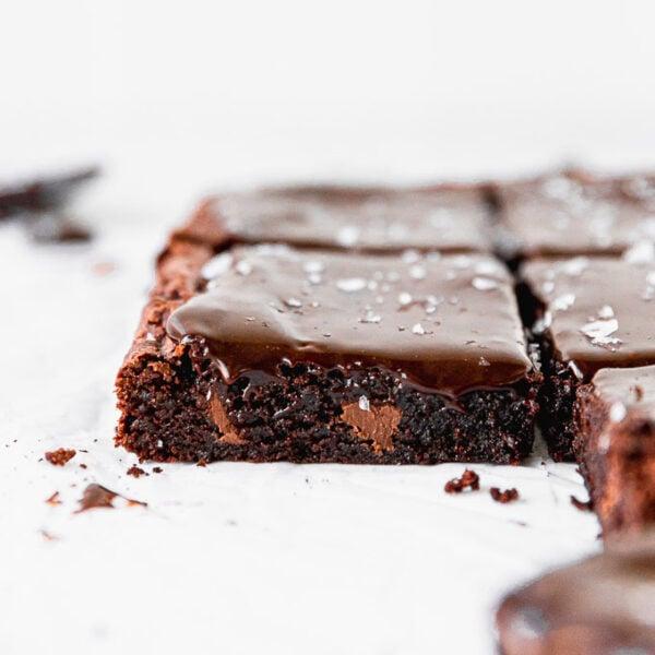 Close-up shot of a single espresso brownie with ganache