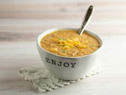 close-up shot of a spoonful of shepherd's pie soup being lifted from a bowl
