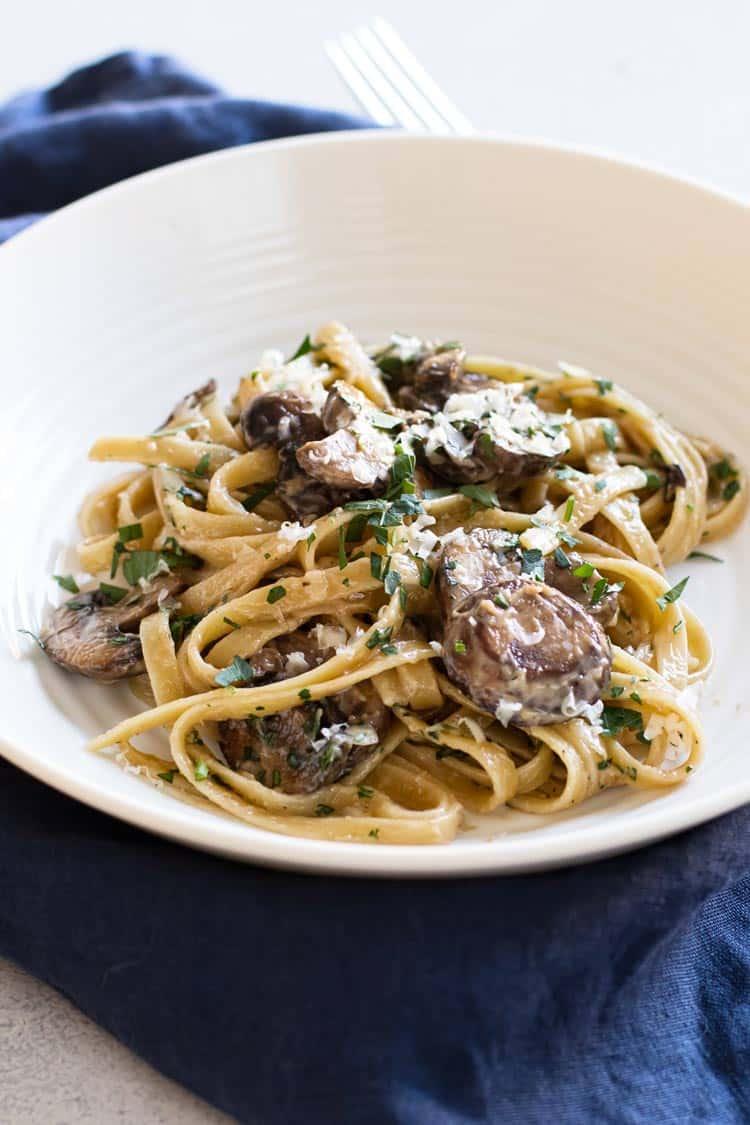 Close-up of the ingredients, highlighting the wild mushrooms and truffle oil