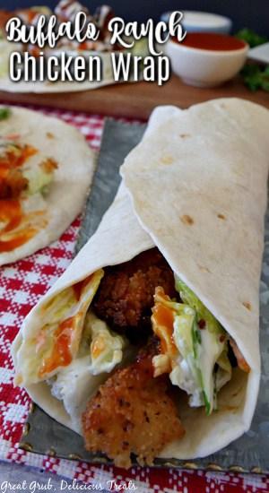 Close-up of buffalo chicken, ranch dressing and tortilla
