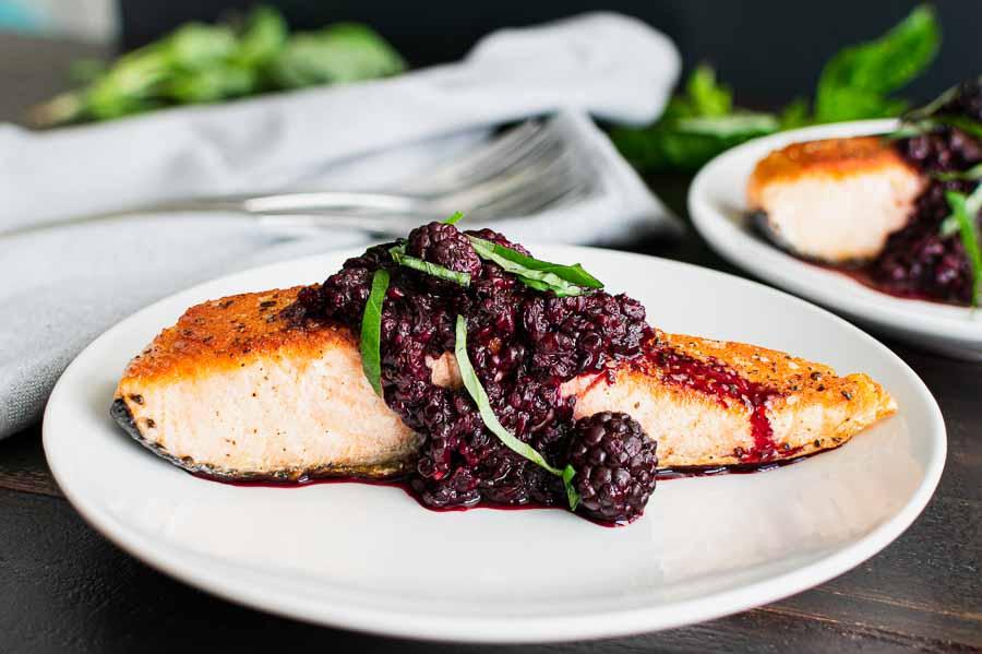 Grilled salmon topped with blackberry sage butter