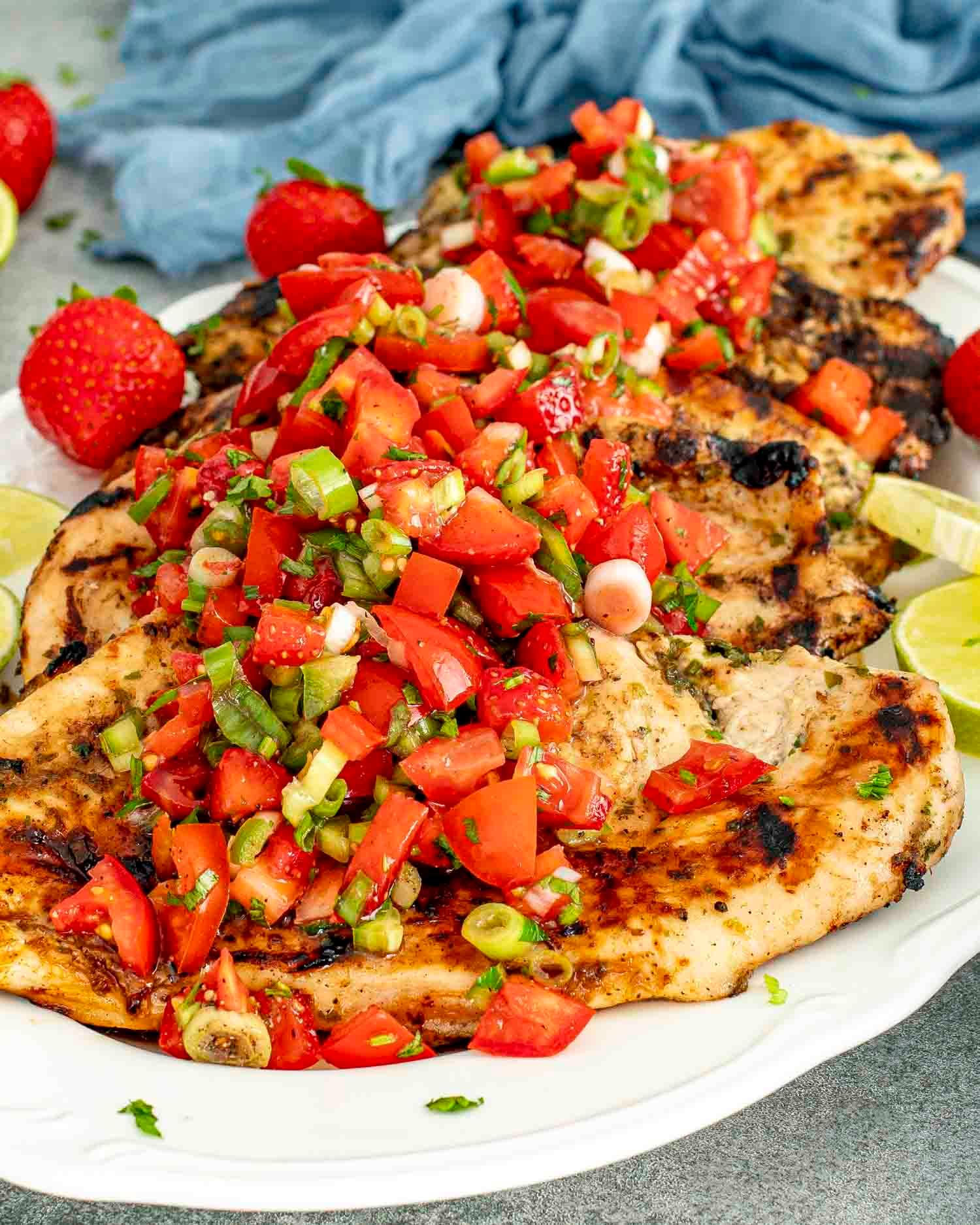 vibrant strawberry salsa with lime and cilantro garnish