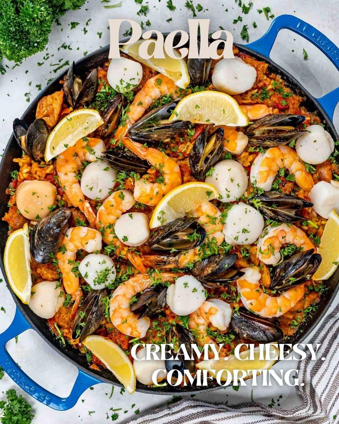Overhead view of Instant Pot Chorizo Paella with Mussels, garnished with parsley and lemon wedges