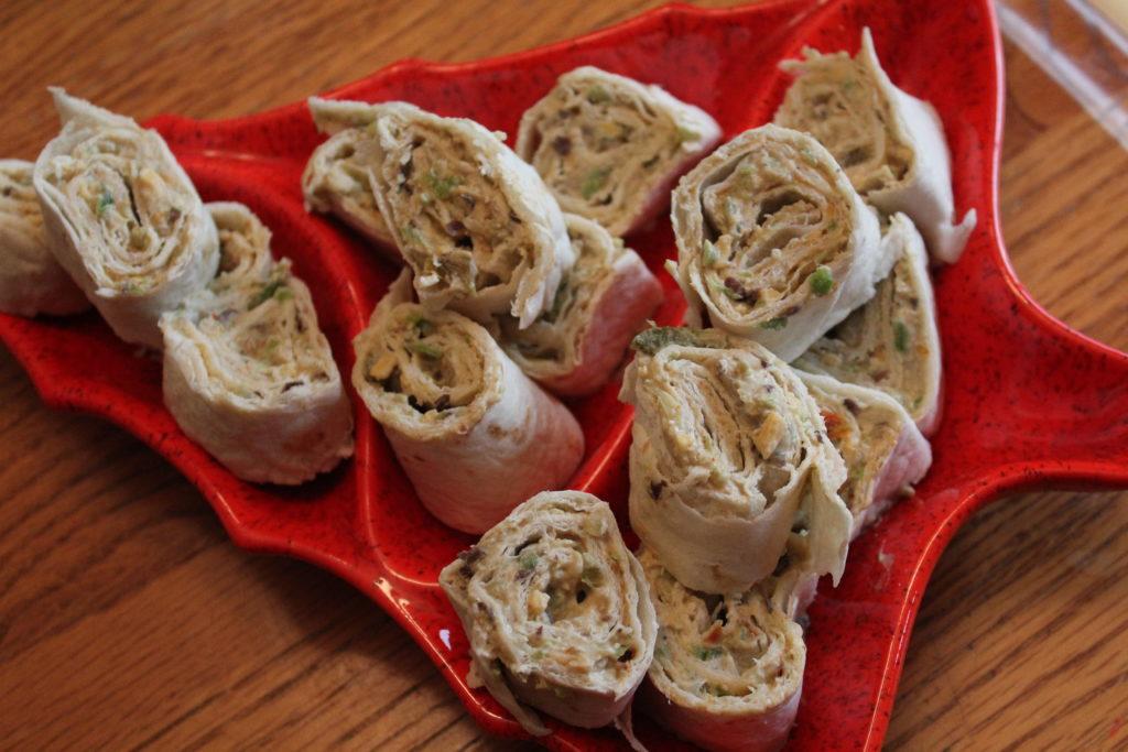 ingredients for avocado and black bean spring rolls laid out on a table