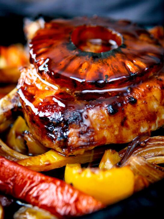 Close-up shot of a juicy pork and pineapple roti