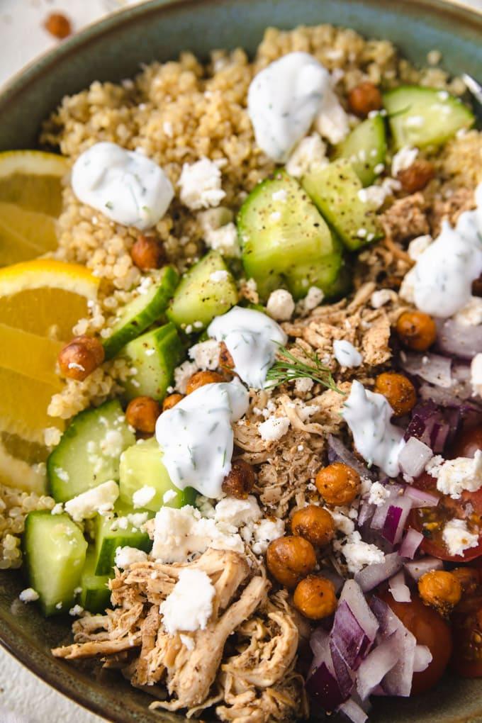 Close up shot of Chicken Shawarma Power Bowl garnished with fresh herbs.