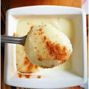 Close-up shot of a spoonful of wheat and semolina pudding