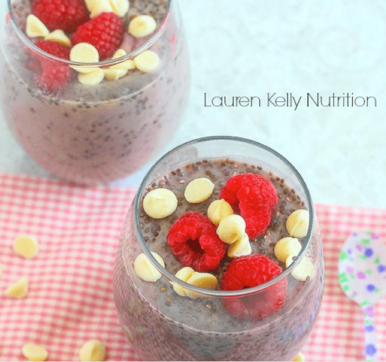 A person enjoying a bowl of white chocolate raspberry chia pudding