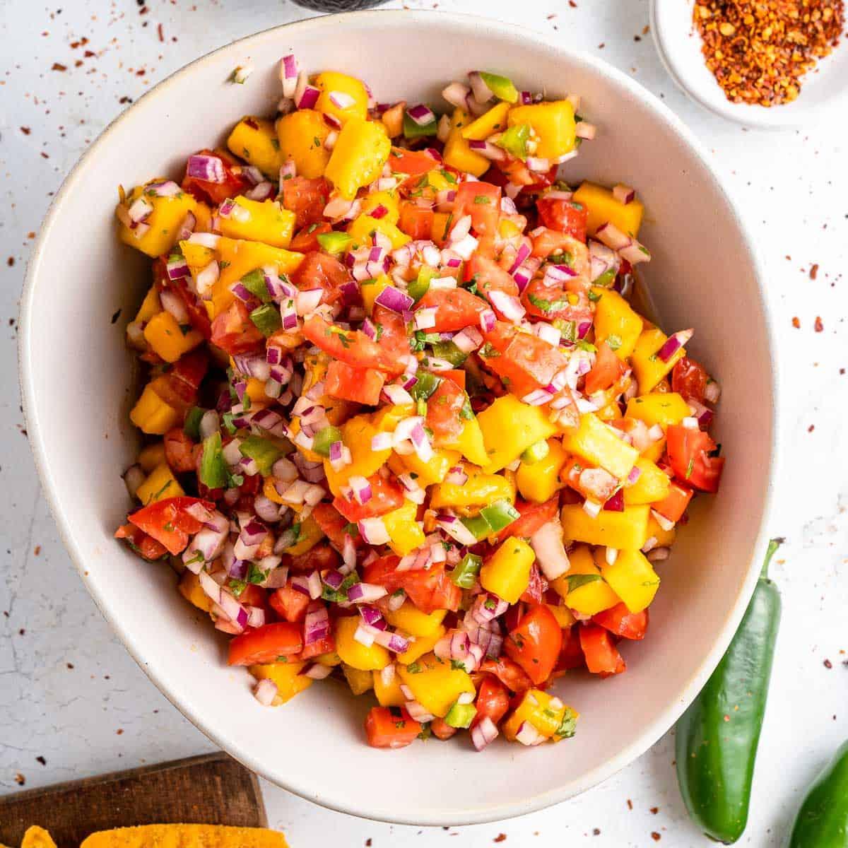 Close-up of the mango salsa, highlighting its vibrant colors and fresh ingredients.