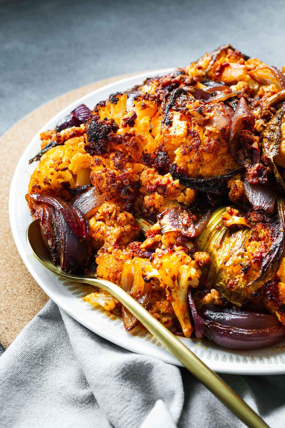 Spicy Harissa Roasted Cauliflower on a baking sheet
